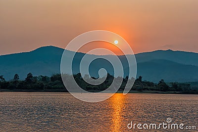 Sunset on mountain lake in Chiang Rai,North of Thailand Stock Photo