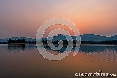 Sunset on mountain lake in Chiang Rai,North of Thailand Stock Photo