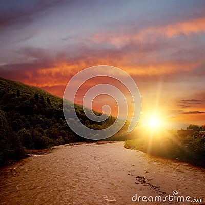Sunset on mountain river Stock Photo