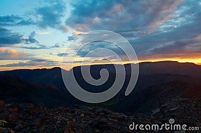 Sunset in mountains Stock Photo