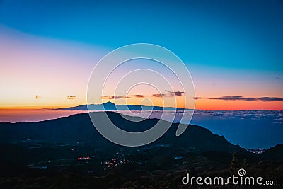 Sunset in mountains on Grand Canaria with view on Teide Stock Photo