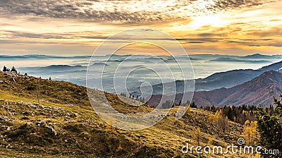 Sunset in the mountains. View of the valley Stock Photo