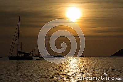 Sunset on the Nai Harn beach in Phuket island Stock Photo