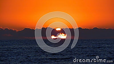 Sunset In The Ocean Stock Photo