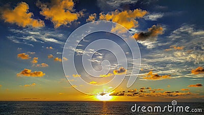 Sunset in the ocean Stock Photo