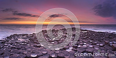 The Giant`s Causeway in Northern Ireland at sunset Stock Photo