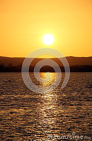 Sunset over the Birket Siwa salt-water lake, in the Siwa oasis, Egypt Stock Photo