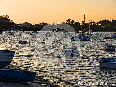 Sunset over Boats in the Bay of Corfu Town on the Greek island of Corfu Editorial Stock Photo