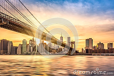Sunset over Brooklyn Bridge in New York City Stock Photo