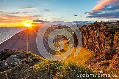 Sunset over cliffs in Vik, Iceland Stock Photo