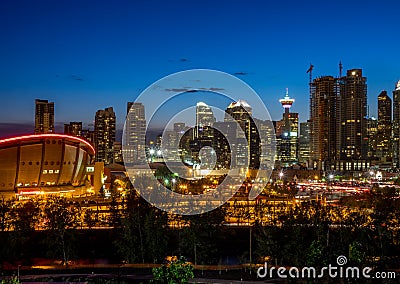 Sunset Over Downtown Calgary and Saddledome Editorial Stock Photo