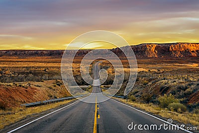 Sunset over an empty road in Utah Stock Photo