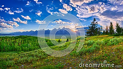 Sunset over the Grand Teton mountain range Stock Photo