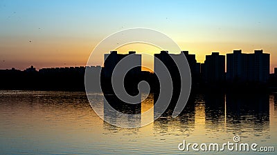 Sunset over lake in Minsk, the Chizhovka district. Belarus Stock Photo