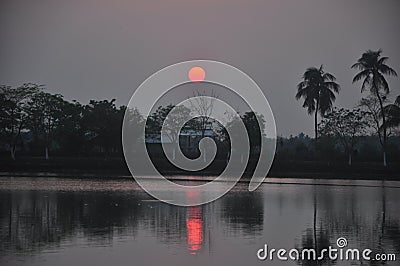 Sunset over a lake Stock Photo