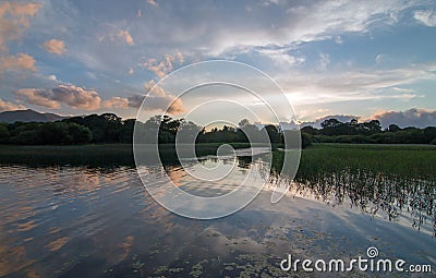 Sunset over Lough Leane Lake Leane on the Ring of Kerry in Killarney Ireland Stock Photo