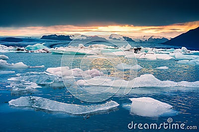 Sunset over natural iceberg in Jokulsarlon glacieer lagoon Stock Photo