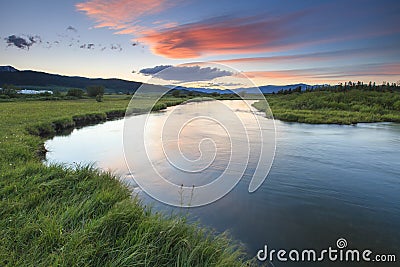 Sunset over the river Stock Photo