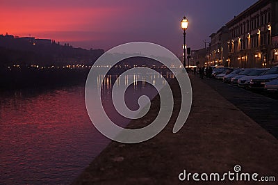 Sunset over river Arno in Florence Stock Photo