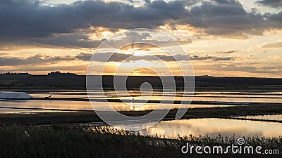 Sunset over the saltworks Stock Photo