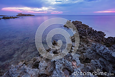 Sunset over the sea in the Sardinian west coast, Italy Stock Photo