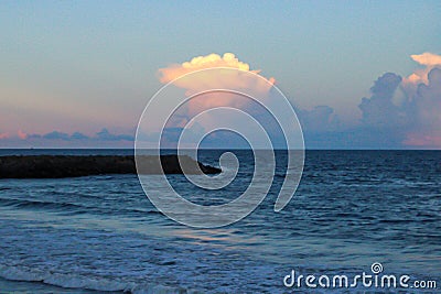 Sunset over a seashore Stock Photo