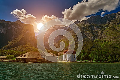 Sunset over St.Bartolomei Church on Bonigsee Lake Stock Photo