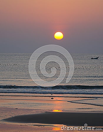 Sunset over to ocean at a beach near MÅ©i NÃ©, Vietnam. Stock Photo