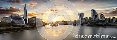 Sunset over the urban skyline of London, UK Editorial Stock Photo