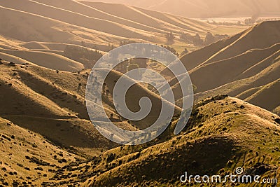 Sunset over valley in Wither Hills Stock Photo