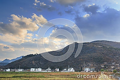 Sunset over the village of Qifeng in Yunnan, China Stock Photo