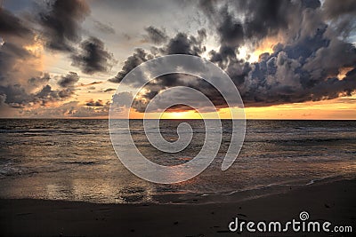 Sunset over the White sand at Delnor Wiggins State Park Stock Photo