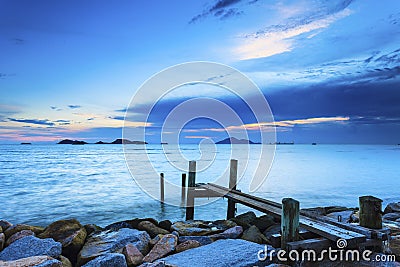 Sunset over a wooden bridge in Hong Kong Stock Photo