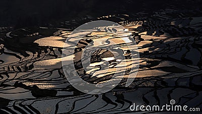 Sunset over YuanYang rice terraces in Yunnan, China, one of the latest UNESCO World Heritage Sites Stock Photo