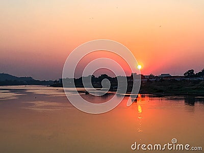 sunset At Pak Nam Pho, Nakhon Sawan Stock Photo