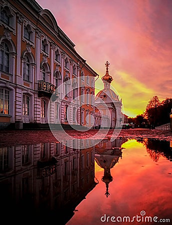 Sunset at palace in Russia with shadow in water on autumn Stock Photo