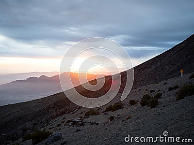 Sunset panorama of mountain range silhouette layers haze dust fog clouds at Misti volcano Arequipa Peru Andes Stock Photo