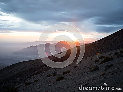 Sunset panorama of mountain range silhouette layers haze dust fog clouds at Misti volcano Arequipa Peru Andes Stock Photo