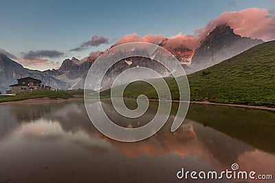 Sunset in Passo Rolle - Baita Segantini lake in Dolomite mountain range, Italy Stock Photo
