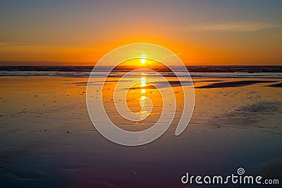 Sunset at Piha Beach Stock Photo