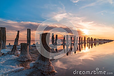 Sunset on a pink salt lake, a former mine for the extraction of Stock Photo