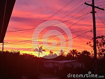Sunset and powerlines Stock Photo