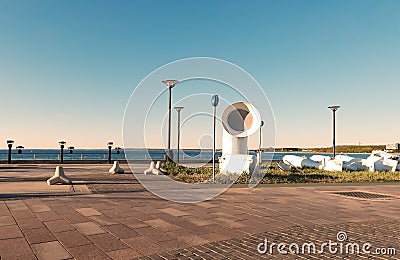 Sunset on promenad at beach Reidi tee in Tallinn on horizon Baltic sea water ,nautical symbols Editorial Stock Photo