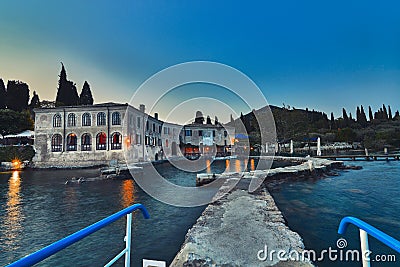 Sunset Punta San Vigilio harbour at Garda Lake, Italy Stock Photo