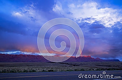 Sunset Rainbow Over Vermilion Cliffs In Arizona Stock Photo