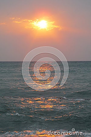 Sunset red light above the sea Stock Photo