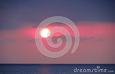 Sunset red light above the sea Stock Photo