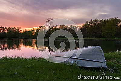 Sunset reflecting on a pond Stock Photo