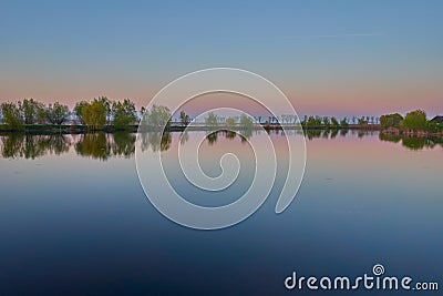 Sunset reflexions at Comana lake Stock Photo