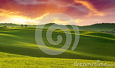 Sunset on rolling hills Stock Photo